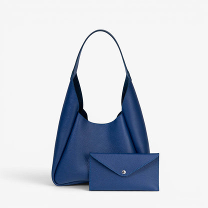 Pache blue pebbled leather hobo bag with matching wallet, magnetic closure, everyday style.