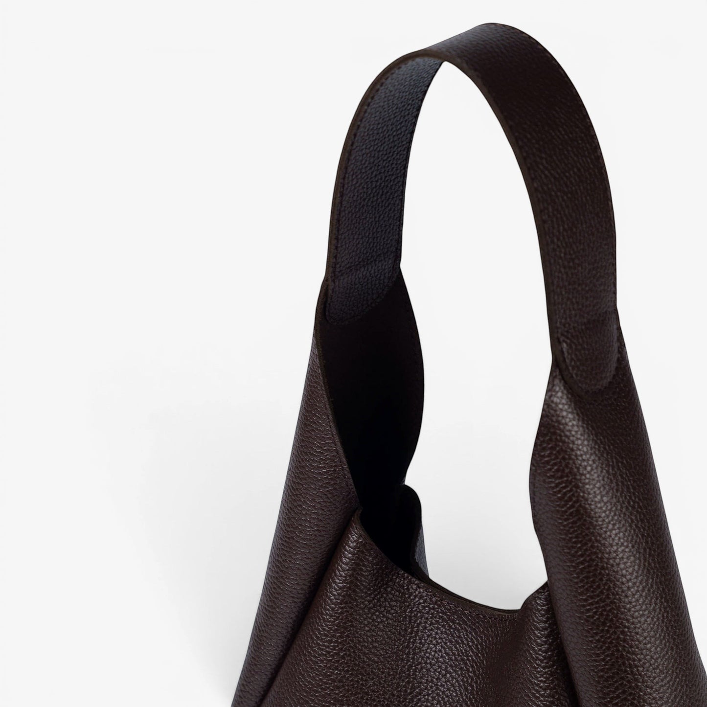 Pache Torba hobo bag in chocolate brown pebbled leather with a magnetic closure and matching wallet. Available in 3 sizes.