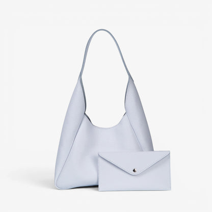 Pache light blue pebbled leather hobo bag with matching envelope wallet, magnetic closure, everyday style.